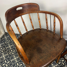 Load image into Gallery viewer, They are antique mid-19th century captain-style tub chairs with a bentwood back and arms and turned spindles, each bearing a unique story and character.
