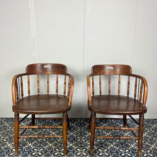 Load image into Gallery viewer, They are antique mid-19th century captain-style tub chairs with a bentwood back and arms and turned spindles, each bearing a unique story and character.
