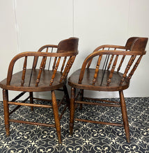 Load image into Gallery viewer, They are antique mid-19th century captain-style tub chairs with a bentwood back and arms and turned spindles, each bearing a unique story and character.
