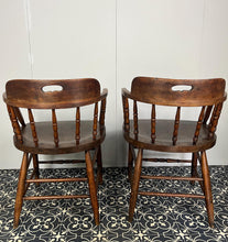 Load image into Gallery viewer, They are antique mid-19th century captain-style tub chairs with a bentwood back and arms and turned spindles, each bearing a unique story and character.
