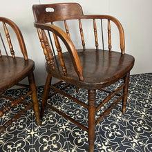 Load image into Gallery viewer, They are antique mid-19th century captain-style tub chairs with a bentwood back and arms and turned spindles, each bearing a unique story and character.
