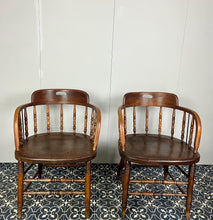 Load image into Gallery viewer, They are antique mid-19th century captain-style tub chairs with a bentwood back and arms and turned spindles, each bearing a unique story and character.
