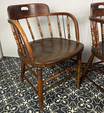 Load image into Gallery viewer, They are antique mid-19th century captain-style tub chairs with a bentwood back and arms and turned spindles, each bearing a unique story and character.
