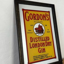 Load image into Gallery viewer, The stunning design features the famous London gin brand in vivid red fonts, a border, and a vibrant yellow background with the familiar logo on the boar&#39;s head.
