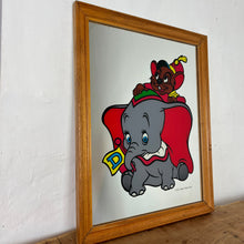 Load image into Gallery viewer, Stunning vintage Disney Dumbo mirror featuring the famous elephant and Timothy the mouse in beautiful vivid tones in bright stand out colours to make and impact in any Disney collectors home or children room.
