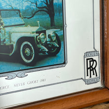 Load image into Gallery viewer, Vintage stunning Rolls Royce Silver Ghost 1911 advertising mirror featuring a glamourous design with antique pictures of the luxury car in a royal setting with an elegant lady, art deco finish with the borders, and the famous branding.

