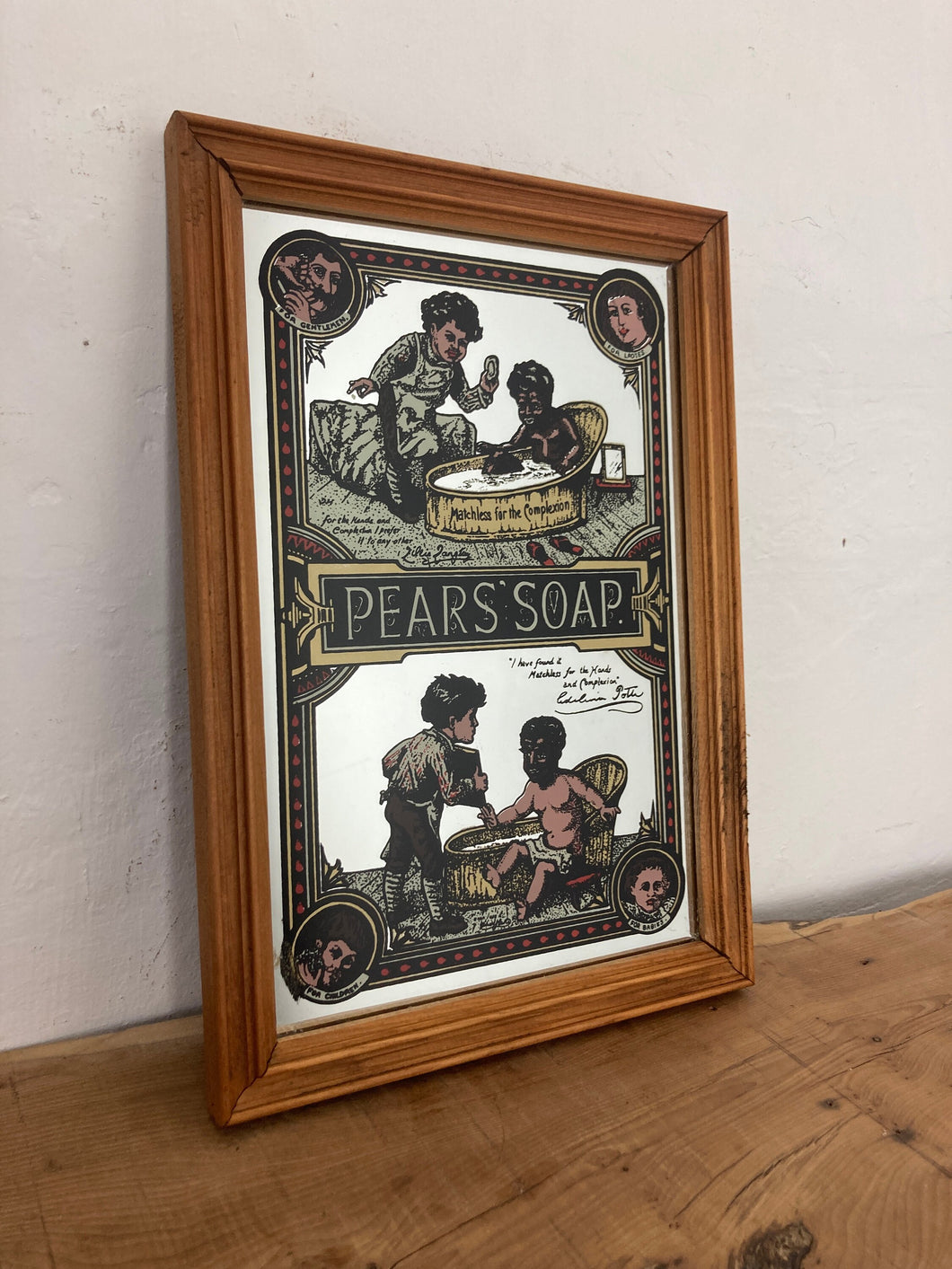 An Appealing Vintage mid-century Pears Soap Advertising mirror featuring an antique Victorian baby bath scene with intricate detail and stand-out fonts.