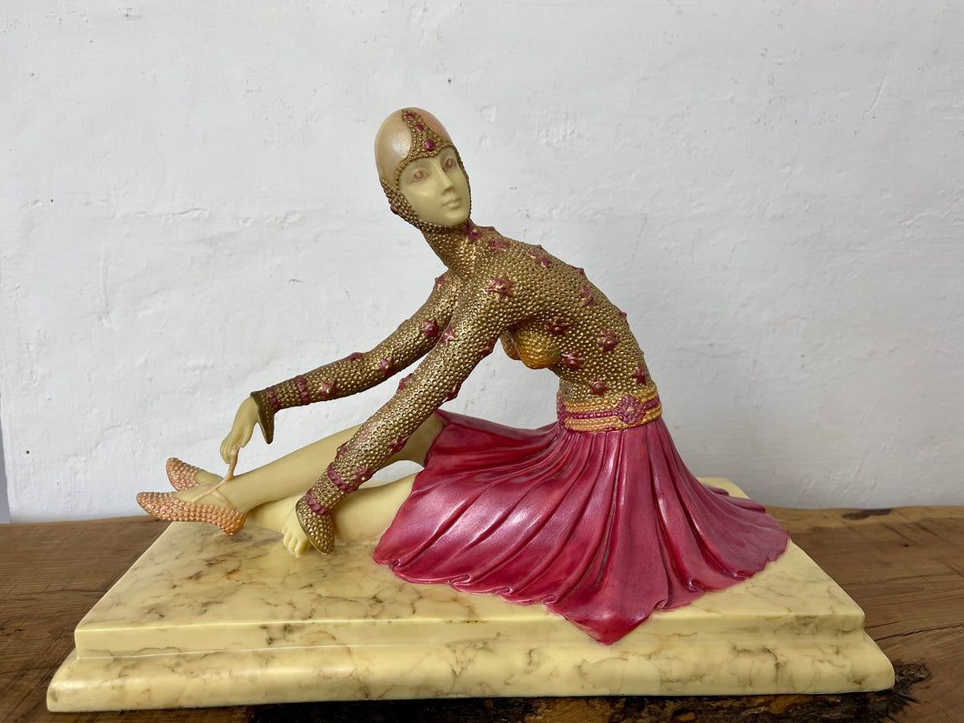 Stunning vintage sculpture based on the Demétre H. Chiparus - tantra piece based on an art deco ballet dancer with intricate design with vivid tones in pinks and creams with unique details on the tutu and pleats in the skirt with a faux marble base