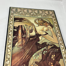 Load image into Gallery viewer, Stunning Mucha art nouveau sign featuring a glamorous lady with elegant clothing in autumnal tones. Around the lady are intricate designs with a selection of sky blues and hints of matt gold blending with shooting blasts of light.

