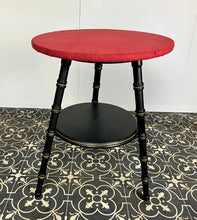 Load image into Gallery viewer, Stylish early 20th-century ebonised faux bamboo coffee or side table with a fantastic design featuring the trend ebony tone with a turned leg finish and sleek gold highlights. It is created in a cricket form with three legs
