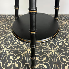 Load image into Gallery viewer, Stylish early 20th-century ebonised faux bamboo coffee or side table with a fantastic design featuring the trend ebony tone with a turned leg finish and sleek gold highlights. It is created in a cricket form with three legs
