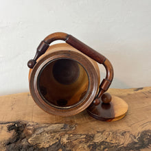 Load image into Gallery viewer, This wonderful vintage-turned wood caddy, with an attractive lid and handle, has a natural wood finish in the design, charming grain, and excellent craftsmanship. It is an elegant and functional addition to your home decor.
