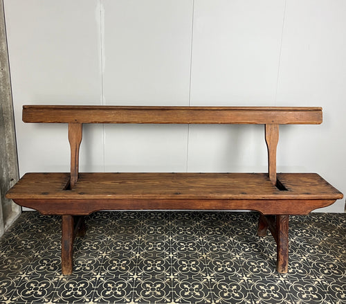 A beautiful Victorian period, pitch pine long, wide and comfortable railway bench, dating from the 2nd half of the 19th century with stunning patina. The bench features an ingenious swing-back design, so it can be sat on from both sides.