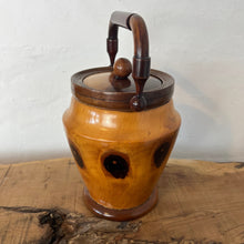 Load image into Gallery viewer, This wonderful vintage-turned wood caddy, with an attractive lid and handle, has a natural wood finish in the design, charming grain, and excellent craftsmanship. It is an elegant and functional addition to your home decor.
