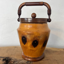 Load image into Gallery viewer, This wonderful vintage-turned wood caddy, with an attractive lid and handle, has a natural wood finish in the design, charming grain, and excellent craftsmanship. It is an elegant and functional addition to your home decor.
