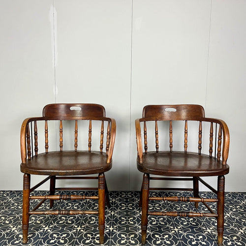 They are antique mid-19th century captain-style tub chairs with a bentwood back and arms and turned spindles, each bearing a unique story and character.