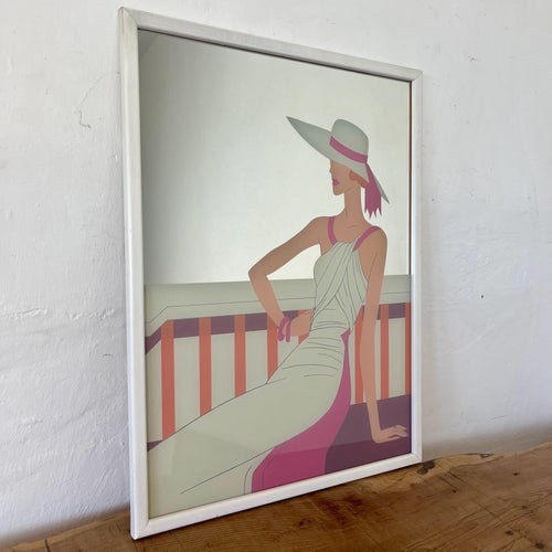 Wonderful art deco mirror featuring a glamorous lady posing with nice detail, wearing a summer dress and hat with a pink ribbon design.