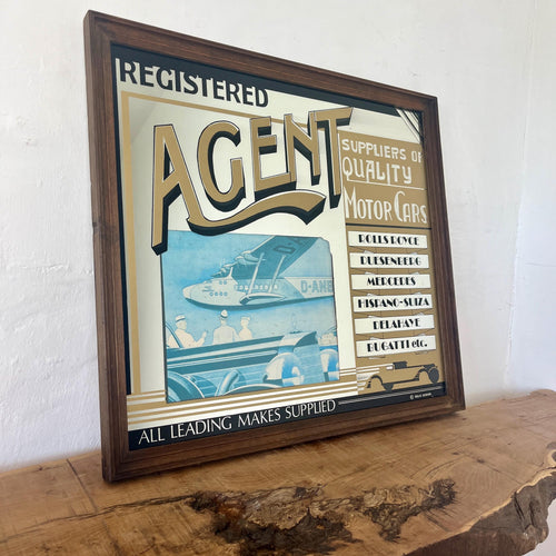 This stunning art deco mirror features a group of the most iconic luxury cars in history, including Rolls Royce, Mercedes, Bugatti, and Duesenberg.