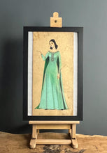 Load image into Gallery viewer, This lovely watercolour of an elegant lady in a flowing emerald green dress with excellent intricate detailing; the face is painted with outstanding design, a beautiful lady with jet black hair.
