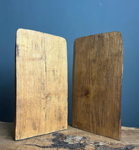 Load image into Gallery viewer, Stunning vintage designer art deco bookends featuring a glamorous lady, intricately detailed in pokerwork, adorned in stylish clothing. The wooden design showcases excellent craftsmanship, making these bookends ideal for holding large books.
