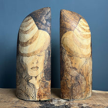 Load image into Gallery viewer, Stunning vintage designer art deco bookends featuring a glamorous lady, intricately detailed in pokerwork, adorned in stylish clothing. The wooden design showcases excellent craftsmanship, making these bookends ideal for holding large books.
