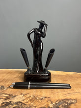 Load image into Gallery viewer, This fabulous piece showcases a glamorous lady, artfully sculpted and adorned with a vibrant black glaze pottery finish
