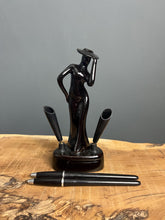 Load image into Gallery viewer, This fabulous piece showcases a glamorous lady, artfully sculpted and adorned with a vibrant black glaze pottery finish
