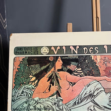 Load image into Gallery viewer, Stunning Alphonse Mucha - Vin Des Incas is an excellent, detailed, and bold-toned design with a medical and historical subject created using a wooden board design from the vintage mid-century era.
