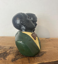 Load image into Gallery viewer, A stunning vintage 1940s ceramic bust of two African American jazz singers with a beautiful design finish with excellent facial features and expressions with a green suit, yellow shirt, and maroon bowtie, creating an exciting figure.
