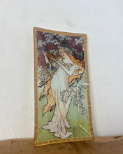 Load image into Gallery viewer, ncredible, vibrant Mucha spring art nouveau ring dish or decorative dish featuring a glamorous lady with a vivid, colourful tree and cherry blossom background. She is wearing a beautiful white dress and a floral headband, playing her harp
