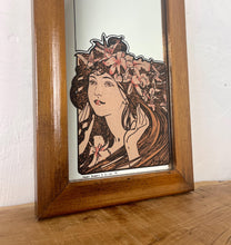 Load image into Gallery viewer, The stunning design features a glamorous lady bust wearing a flower headdress with wonderful detail. The image is focused on the face and hair, with fine design in a subtle peach tone. The border is equally impressive, with a Art Nouveau swirl.
