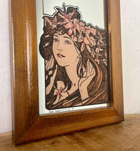 Load image into Gallery viewer, The stunning design features a glamorous lady bust wearing a flower headdress with wonderful detail. The image is focused on the face and hair, with fine design in a subtle peach tone. The border is equally impressive, with a Art Nouveau swirl.
