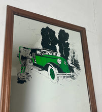 Load image into Gallery viewer, A Stylish Renault advertising mirror features a classic car with stand-out green detail. The couple wears elegant clothing and looks at their map against a woodland noir background.
