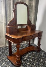 Load image into Gallery viewer, Crafted from elegant quality mahogany, it has a shaped mirror set within a frame. Stunning carved and scrolled supports lead to a pair of two small drawers. It has a moulded edge to the shaped dressing table top with one central drawer.
