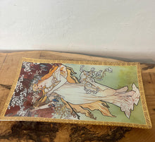 Load image into Gallery viewer, ncredible, vibrant Mucha spring art nouveau ring dish or decorative dish featuring a glamorous lady with a vivid, colourful tree and cherry blossom background. She is wearing a beautiful white dress and a floral headband, playing her harp
