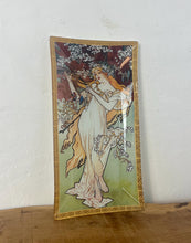 Load image into Gallery viewer, ncredible, vibrant Mucha spring art nouveau ring dish or decorative dish featuring a glamorous lady with a vivid, colourful tree and cherry blossom background. She is wearing a beautiful white dress and a floral headband, playing her harp
