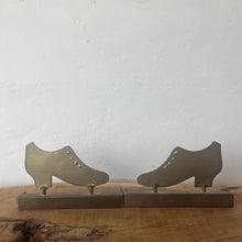 Load image into Gallery viewer, Superb WW1 Trench Art Crafted Lady Shoes Bookends. These were bought as part of a military collection and have been handcrafted from hammered brass, which was produced from a shell casing.
