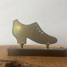 Load image into Gallery viewer, Superb WW1 Trench Art Crafted Lady Shoes Bookends. These were bought as part of a military collection and have been handcrafted from hammered brass, which was produced from a shell casing.
