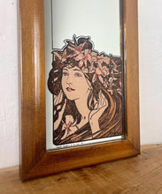 Load image into Gallery viewer, The stunning design features a glamorous lady bust wearing a flower headdress with wonderful detail. The image is focused on the face and hair, with fine design in a subtle peach tone. The border is equally impressive, with a Art Nouveau swirl.
