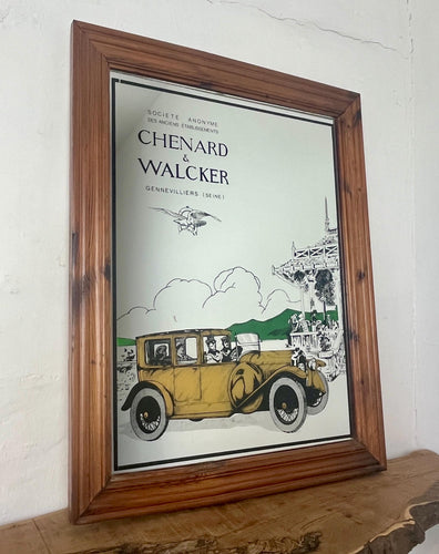 Wonderful vintage automobile mirror featuring an prestige car in mustard tones with the driver and the well dressed couple in the back, bird watching and mountainous background with a selection on people and intricate building.