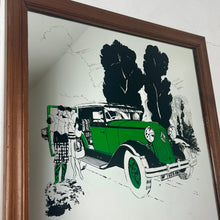 Load image into Gallery viewer, A Stylish Renault advertising mirror features a classic car with stand-out green detail. The couple wears elegant clothing and looks at their map against a woodland noir background.
