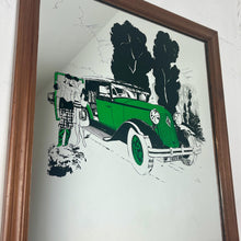 Load image into Gallery viewer, A Stylish Renault advertising mirror features a classic car with stand-out green detail. The couple wears elegant clothing and looks at their map against a woodland noir background.
