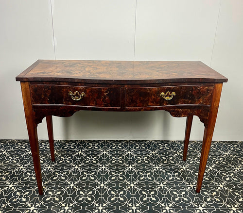 Elegant burr walnut Georgian period antique serpentine table, figured top over a serpentine front with central intricate marquetry burr walnut panel to the drawers and the top. Raised on stylish square tapered legs.