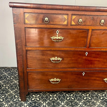 Load image into Gallery viewer, This is a classic late Georgian, mahogany, English chest of drawers dating to early c.1800.This large chest has seven drawers: three small drawers, two medium drawers, and two full-length drawers. It offers generous storage in an elegant and practical form.
