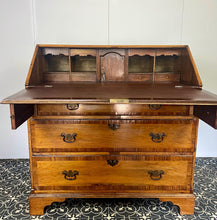 Load image into Gallery viewer, The stunning original George II Bureau, which was written in English circa the mid-18th century, represents the epitome of fine craftsmanship. Featuring camphor wood and rosewood banding, a writing bureau with a perfect leather writing surface.
