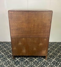 Load image into Gallery viewer, This cabinet contains a long cupboard with vivid-tone burr walnut doors on either side and a stunning detailed design. It has two shelves underneath for extra storage, making it the perfect place to store your martini accessories.
