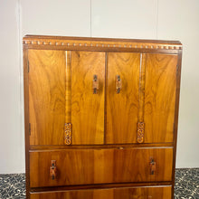 Load image into Gallery viewer, This cabinet contains a long cupboard with vivid-tone burr walnut doors on either side and a stunning detailed design. It has two shelves underneath for extra storage, making it the perfect place to store your martini accessories.
