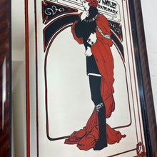 Load image into Gallery viewer, Stunning Mucha mirror featuring vibrant tones featuring a large detailed picture of the figure in orange and black with an intricate pattern border following with the same colours and bold vivid fonts to create a stand out design.
