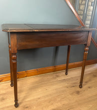 Load image into Gallery viewer, This piece&#39;s tidy and neat finish, with its groundbreaking design, incorporates a lifting centre section with a writing surface and letter racking. The side sections have hinged lids that open to further storage compartments. The table is supported on elegant turned legs. This is a great space-saving piece that will suit a traditional home. It is the perfect size for your laptop and a great addition to the space-saving design.
