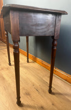 Load image into Gallery viewer, This piece&#39;s tidy and neat finish, with its groundbreaking design, incorporates a lifting centre section with a writing surface and letter racking. The side sections have hinged lids that open to further storage compartments. The table is supported on elegant turned legs. This is a great space-saving piece that will suit a traditional home. It is the perfect size for your laptop and a great addition to the space-saving design.
